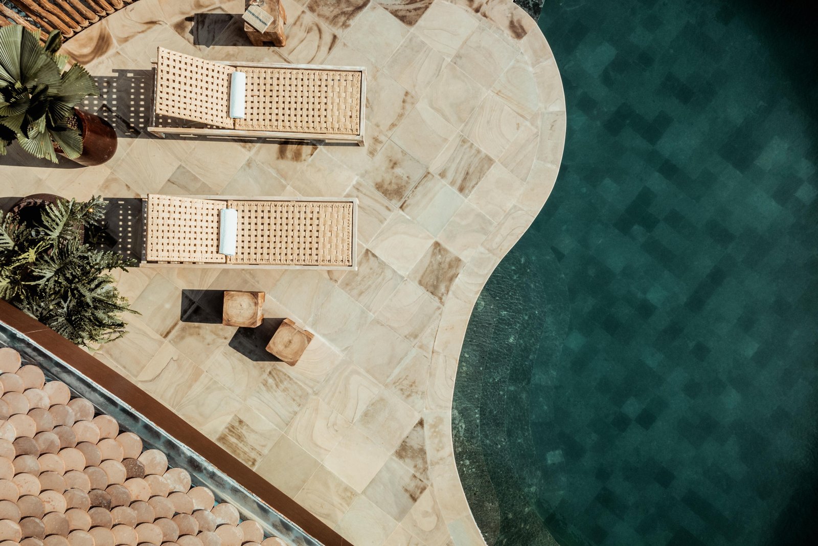 Aerial pool terrace surrounded by tropical gardens — Southeast Asia